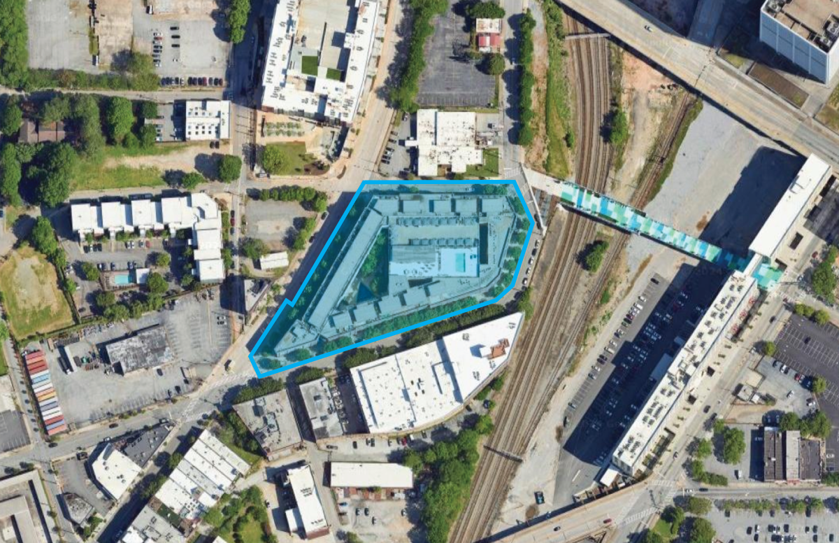 Aerial view of Castleberry Point, a mixed-use condo complex in Downtown Atlanta, GA, with 123 units, highlighted as 'The Alpha Site' where automated self-management processes were successfully implemented